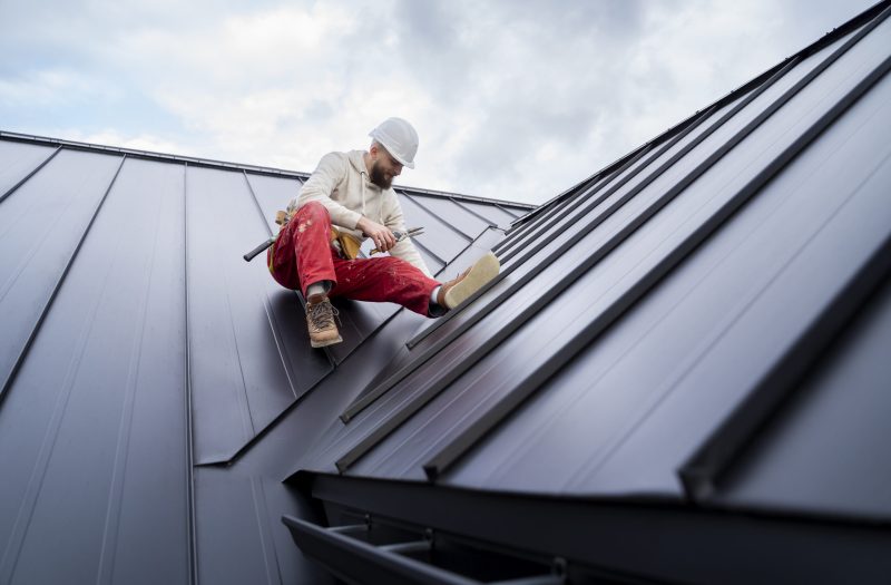 full-shot-man-working-roof